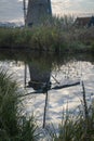 Windmill Reflection on water Royalty Free Stock Photo