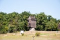 Windmill in a rural area. Wind Farm. Dutch windmill. Landscape with traditional Ukrainian windmills houses in countryside village Royalty Free Stock Photo