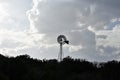 Windmill silhouette in the desert Royalty Free Stock Photo
