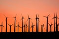 Windmill silhouette at sunset