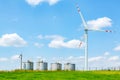 Windmill on the silos on the field Royalty Free Stock Photo