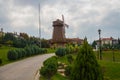 Windmill with sky as background. Sculpture of don Quixote and Sancho Panza. Selale Park, Eskisehir, Turkey
