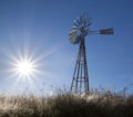 Windmill with sun rising blue Royalty Free Stock Photo
