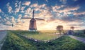Windmill at sunrise in Netherlands Royalty Free Stock Photo
