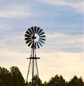 Windmill, sunset, plains, New Mexico Royalty Free Stock Photo