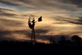 A windmill at sunset