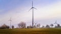 Windmill at Sunset . Wind turbines farm . Royalty Free Stock Photo