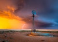 Windmill in a Thunderstorm at Sunset Royalty Free Stock Photo