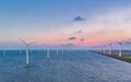 windmill park with a blue sky on a sunny day in the Netherlands, biggest windmill park in the ocean