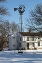 A Windmill and a Two Story Outhouse