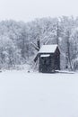 Windmill in Village Museum during snowy winter Royalty Free Stock Photo