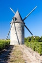 windmill with vineyard near Blaignan, Bordeaux Region, France Royalty Free Stock Photo