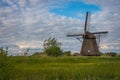 Traditional dutch windmill and beautiful sky nearby Ophemert, Province of Gelderland, The Netherlands