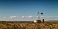 Windmill and Water Tank Royalty Free Stock Photo