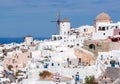 Windmill and white houses of Oia, Santorini, Greece