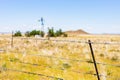 Windmill on a farm in rural grassland area of South Africa