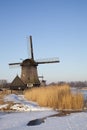 Windmill in winter time with snow Royalty Free Stock Photo