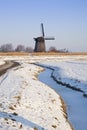 Windmill in winter time with snow Royalty Free Stock Photo