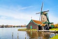 Windmill in Zaanse Schans, traditional village, Netherlands, North Holland Royalty Free Stock Photo