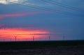 Windmills against a rainbow evening sky Royalty Free Stock Photo