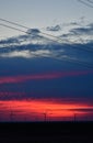 Windmills against a rainbow evening sky Royalty Free Stock Photo