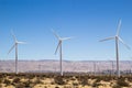 Windmills along a desert landscape