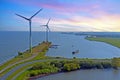 Windmills along the IJsselmeer in the Netherlands
