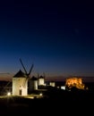 windmills with castle at night, Consuegra, Castile-La Mancha, Sp Royalty Free Stock Photo