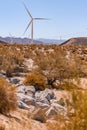 Windmills in Dry desert in southern california USA on bright hot day in summer