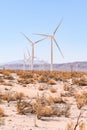 Windmills in Dry desert in southern california USA on bright hot day in summer