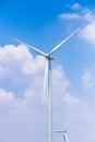 Windmills for electric power production with blue sky