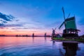 Windmills at famous tourist site Zaanse Schans in Holland with dramatic sky. Zaandam, Netherlands