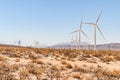 Windmills in Dry desert in southern california USA on bright hot day in summer