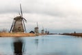 Windmills and a heavily cloudy sky in the winter