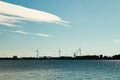 Windmills on island Mussalo in Baltic Sea at sunset, Kotka, Finland Royalty Free Stock Photo