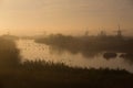 Windmills of Kinderdijk in morning mist