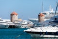 Windmills in the Mandraki port of Rhodes, Greece