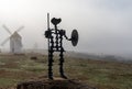 The windmills and metal statue of Don Quijote in Mota del Cuervo in La Mancha