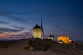 Windmills at the night in Consuegra town in Spain