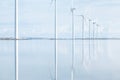 Windmills reflecting in danish Fjord Royalty Free Stock Photo