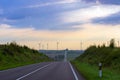 Windmills rotate blades over farmland Royalty Free Stock Photo