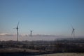 windmills on a cold frosty foggy day Royalty Free Stock Photo