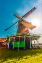 Windmills. Summer at Zaanse Schans. Authentic dutch landscape with old wind mills. Holland, Netherlands Royalty Free Stock Photo
