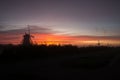 Windmills at sunset