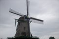 Windmills used for manufacturing of different products in Zannse Schans, Holland 04 25 2022 Royalty Free Stock Photo