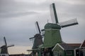 Windmills used for manufacturing of different products in Zannse Schans, Holland 04 25 2022 Royalty Free Stock Photo