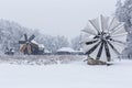 Windmills in Village Museum during snowy winter Royalty Free Stock Photo