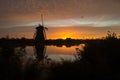 Windmills at sunset