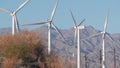 Windmills on wind farm, wind mill energy generators. Desert windfarm, USA. Royalty Free Stock Photo