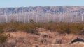 Windmills on wind farm, wind mill energy generators. Desert windfarm, USA.